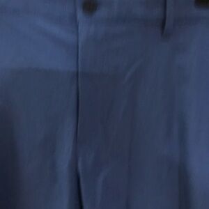 Tommy Bahama men’s short. Blue with a very slight plaid print zipper pockets